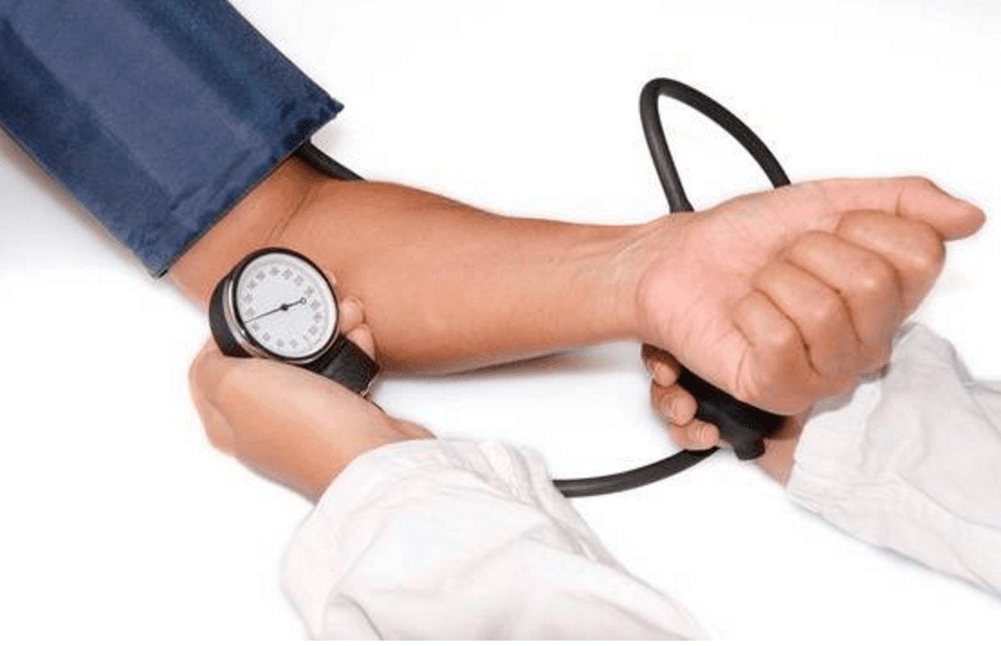 Doctor monitoring patient's vital signs